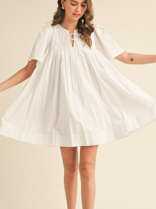 lila pleated swing dress