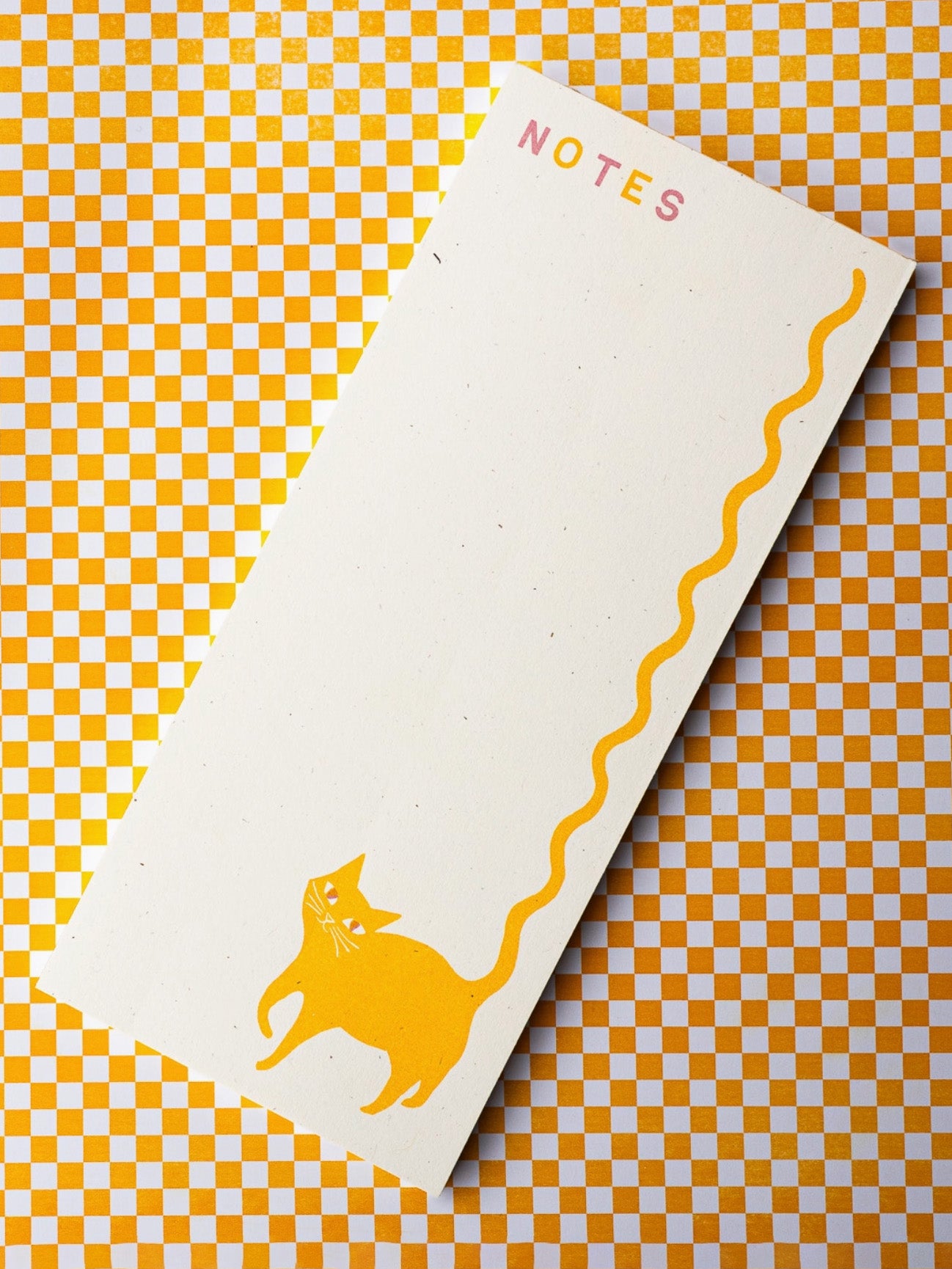 squiggle tail cat risograph notepad