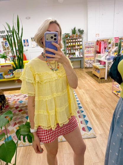 Butter Yellow Ruffle Swing Top