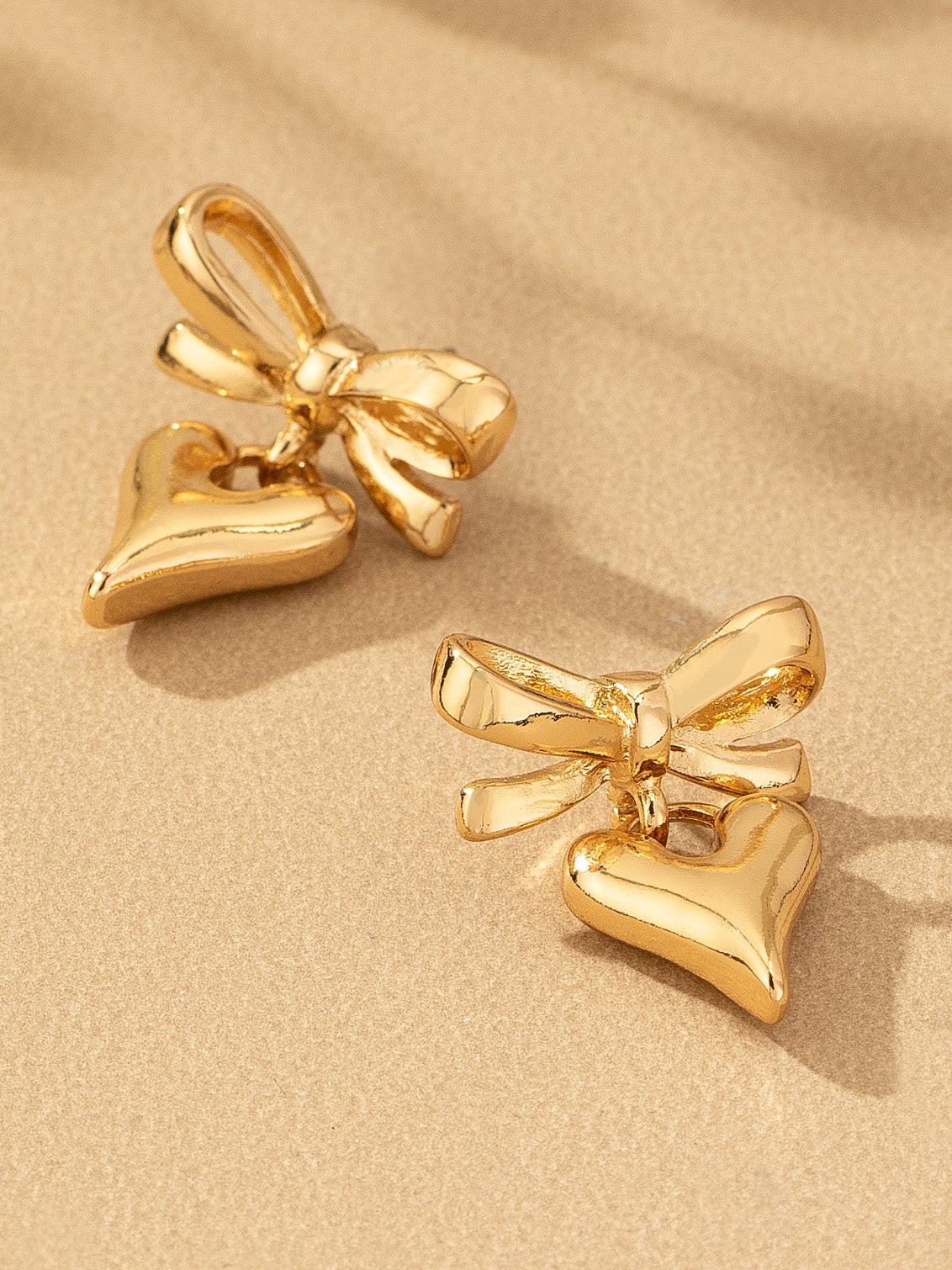 bow love studs