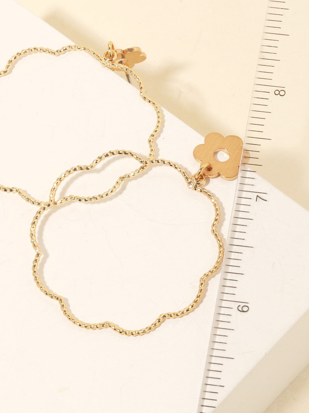 gold bella flower earrings