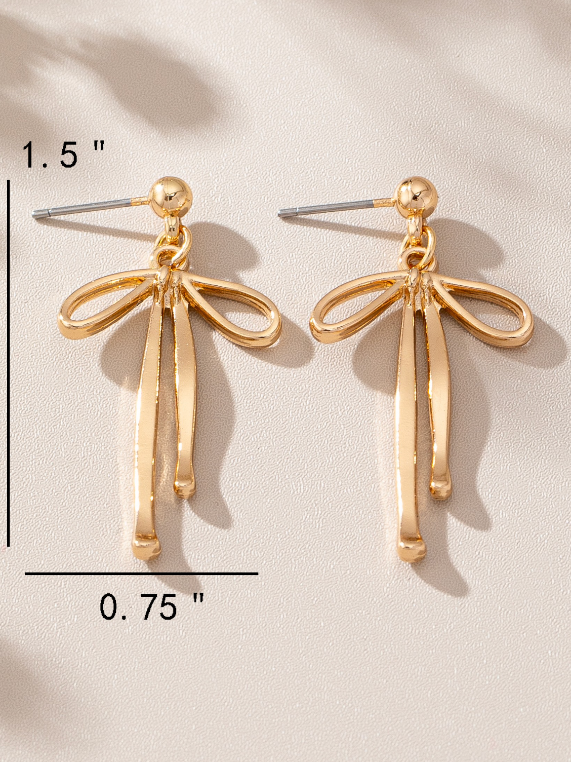 gold bow drop earrings