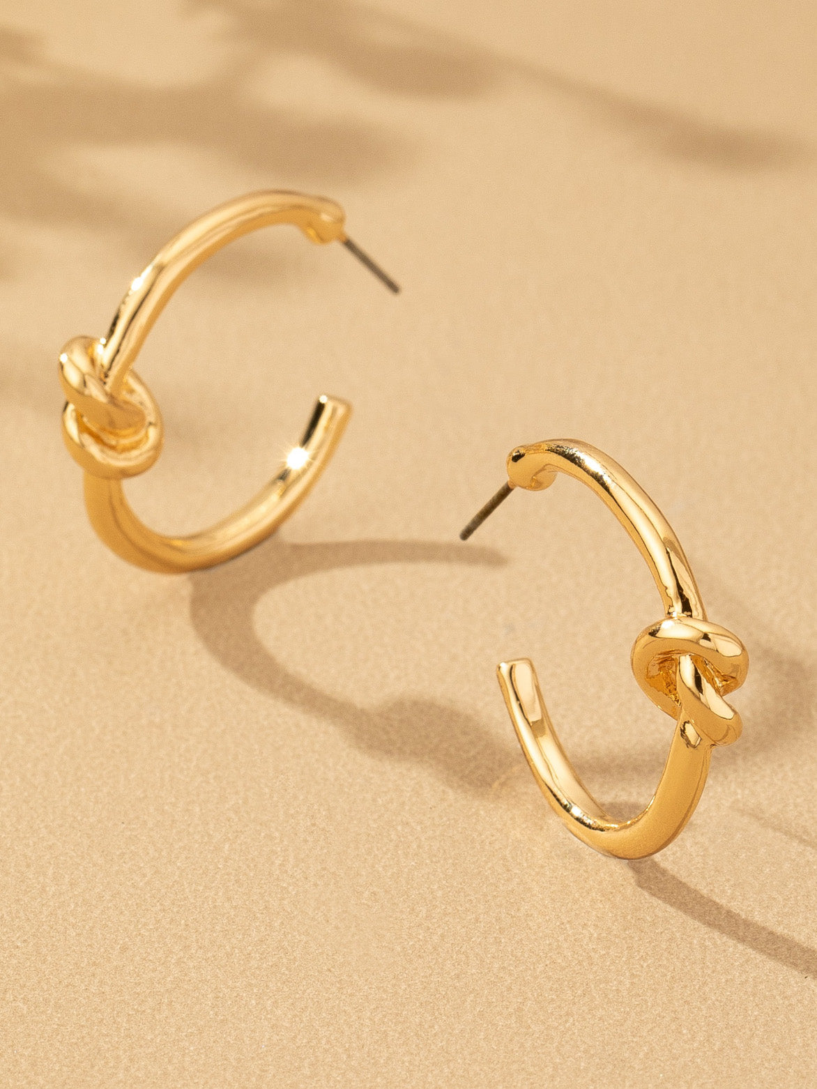 gold knotted mini hoops