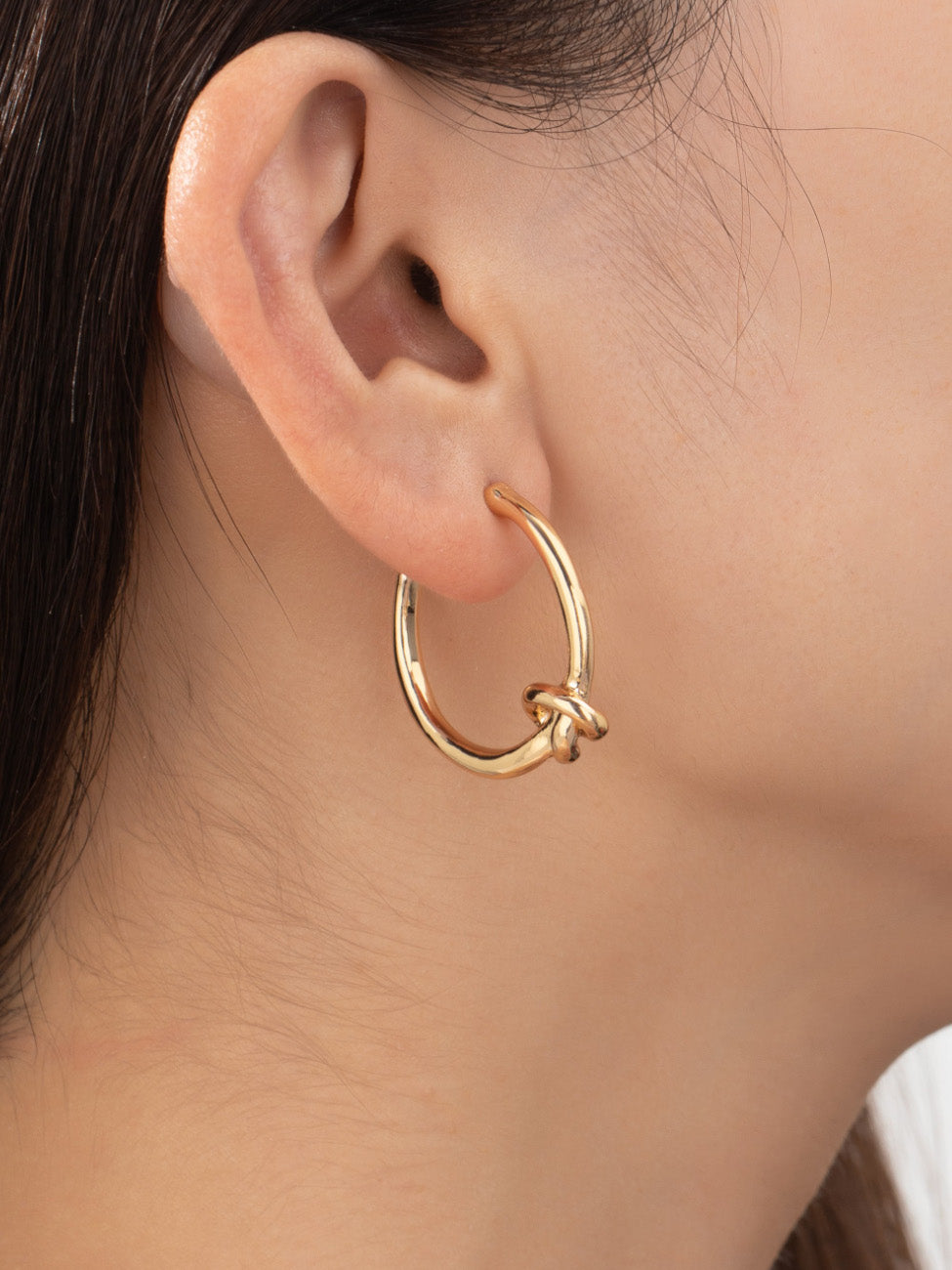 gold knotted mini hoops