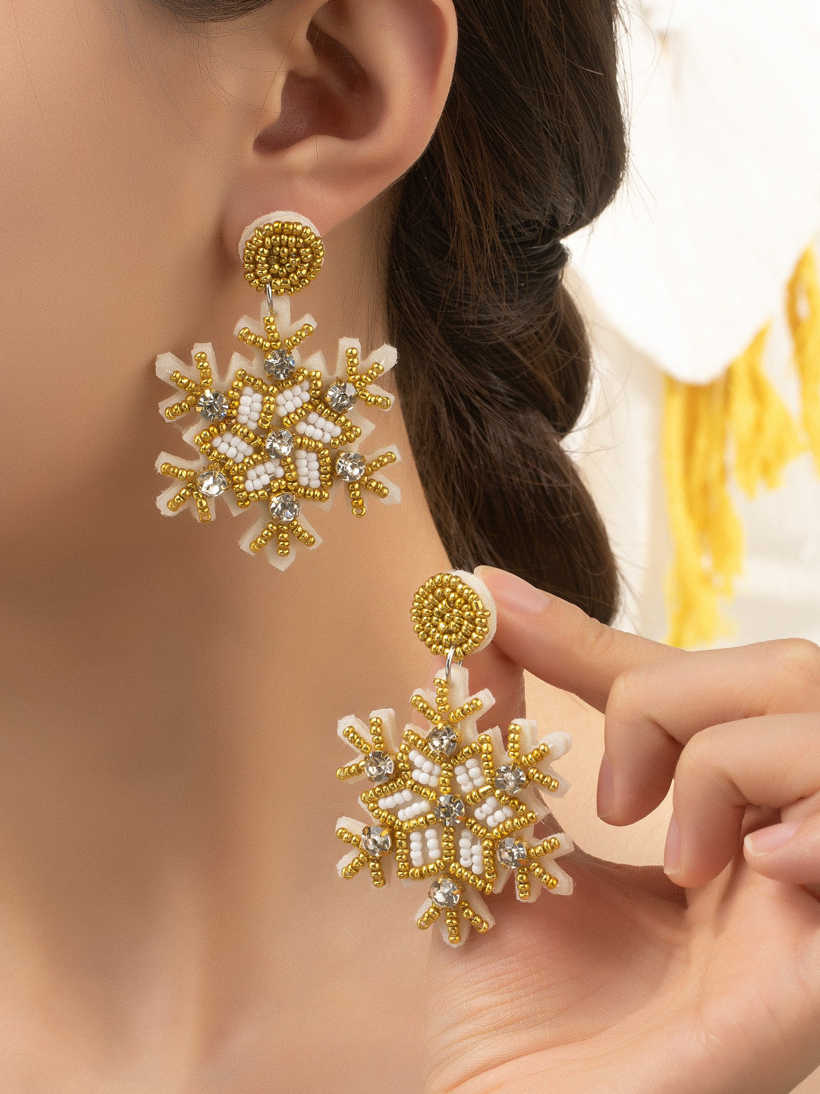 gold snowflake beaded earrings