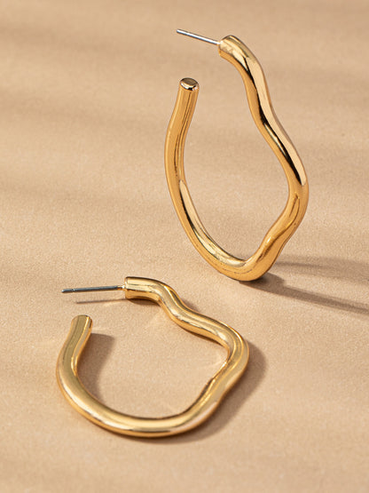 gold wavy hoops