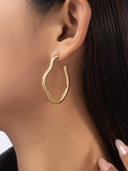 gold wavy hoops