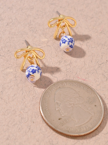 grecian bow studs