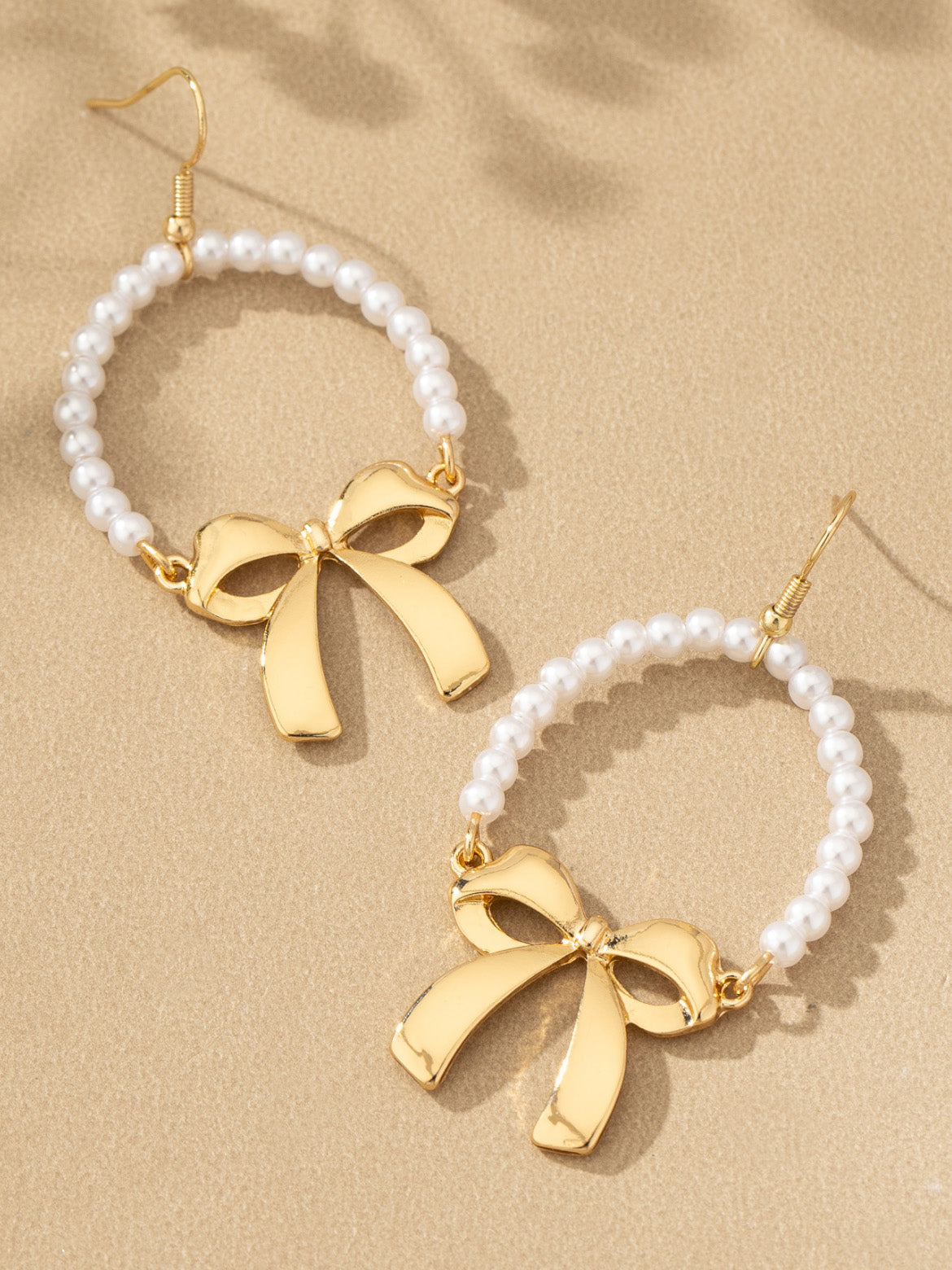 pearly bows dangly earrings