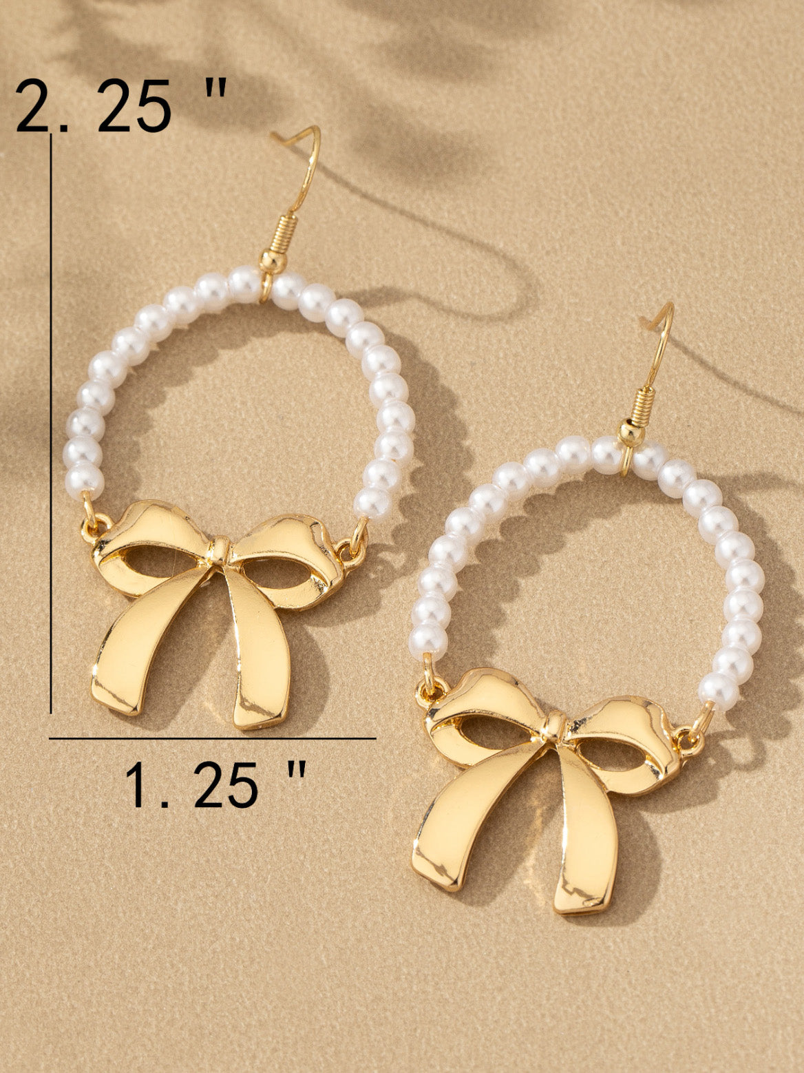 pearly bow dangly earrings