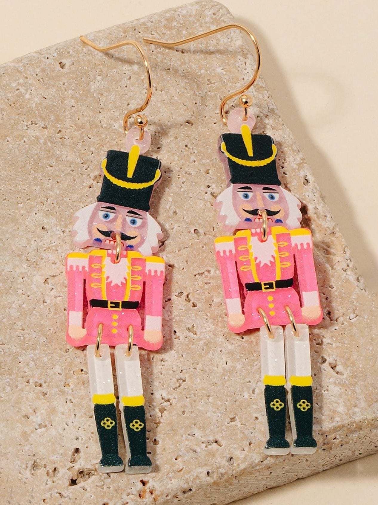 pink nutcracker dangly earrings