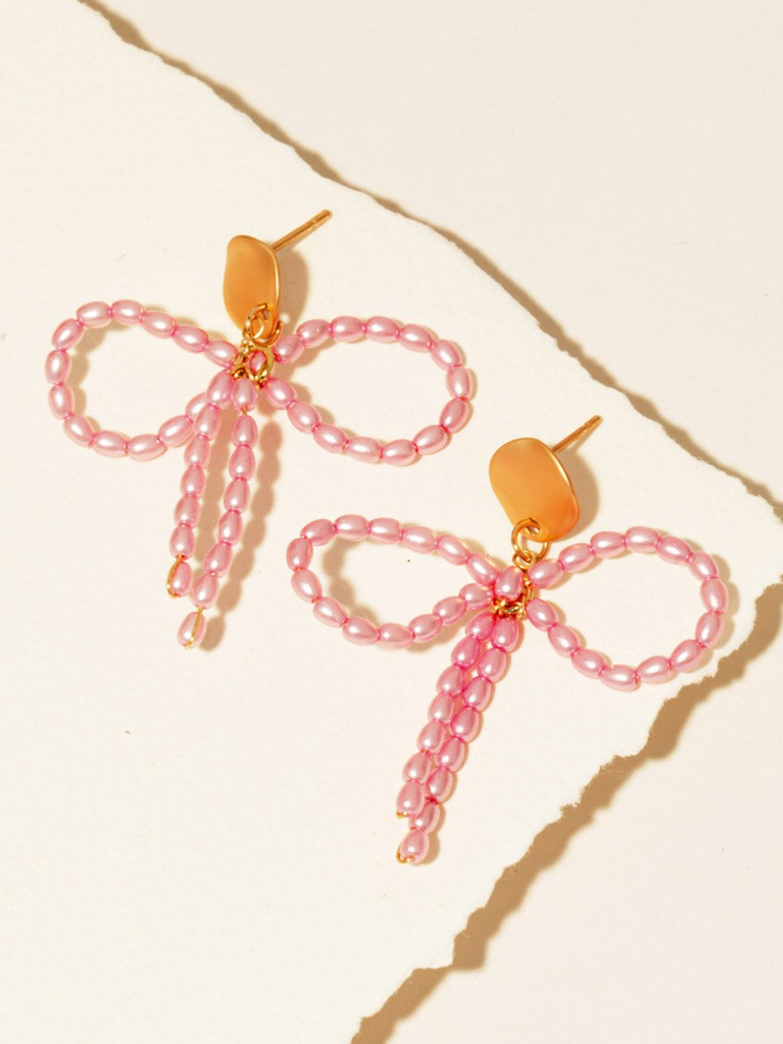 pink pearls beaded bow earrings