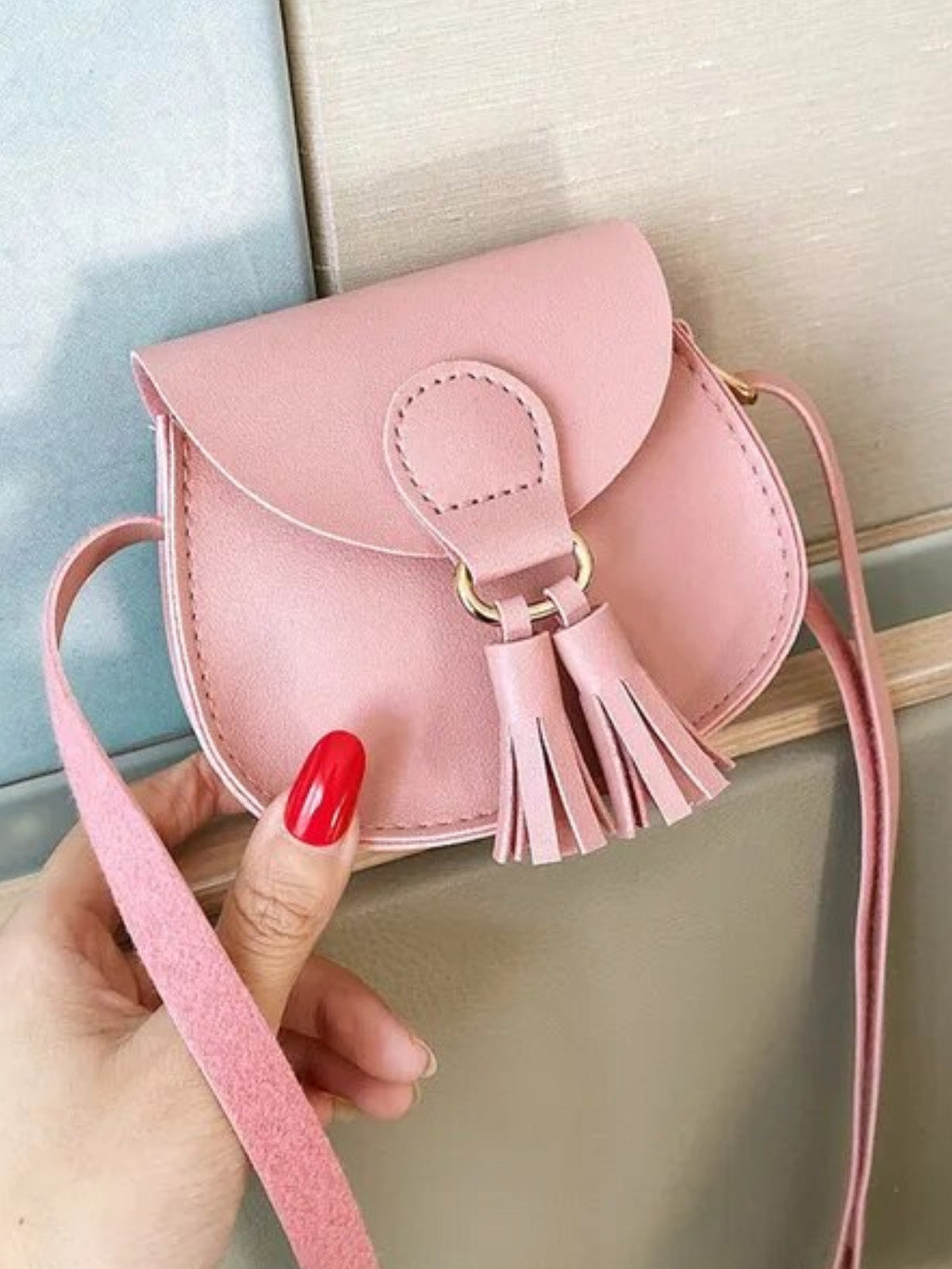 pink tassel tiny bag