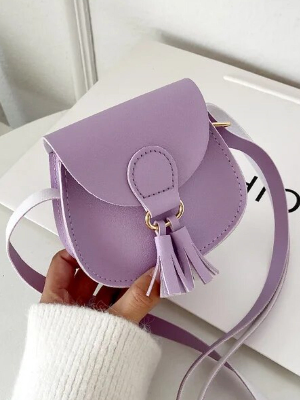 purple tassel tiny bag