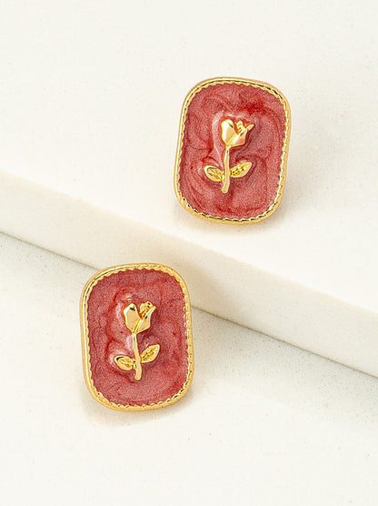 red embossed rose studs