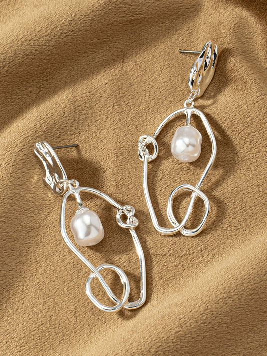 silver pearl venus earrings