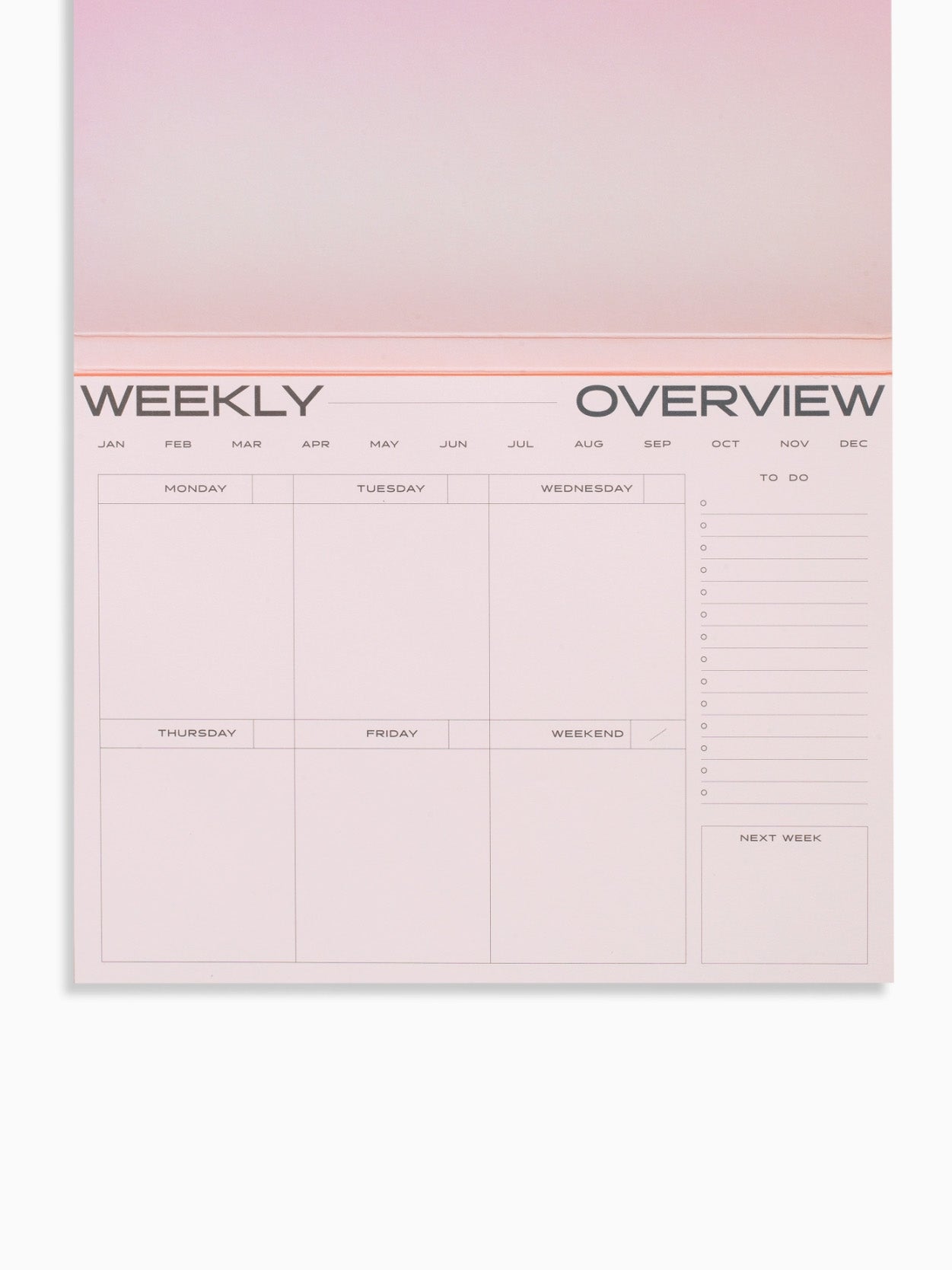 surreal weekly desk planner