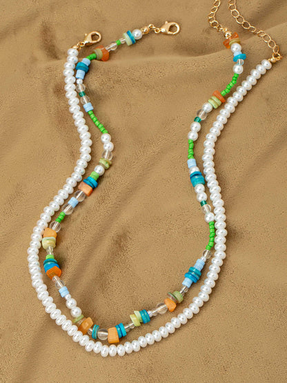 vibrant beaded pearl necklace duo