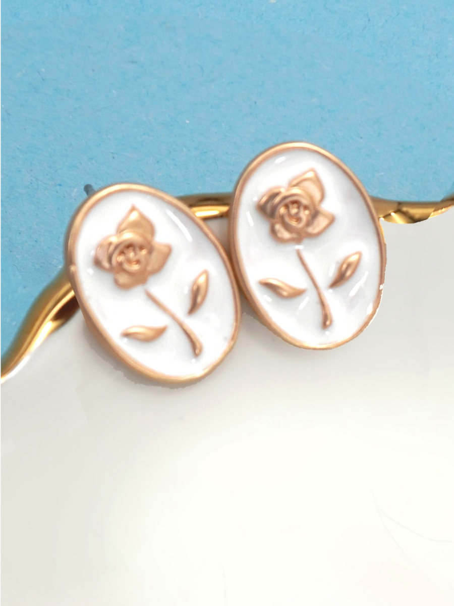 white dainty flower studs